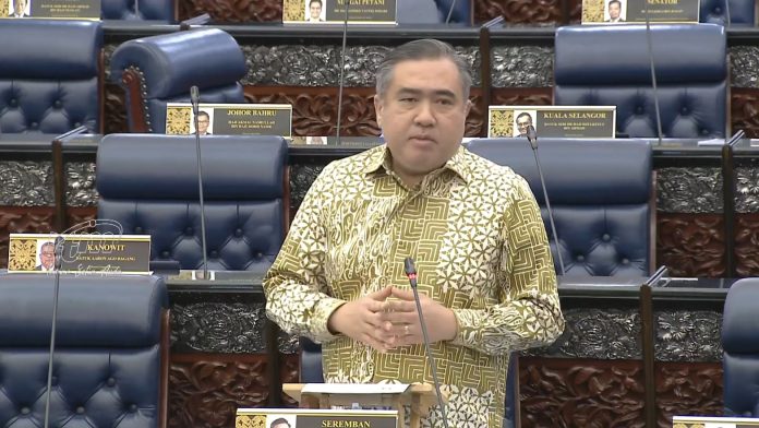 Screenshot of Transport Minister Anthony Loke during the oral question-and-answer session in the Dewan Rakyat on live broadcast at Parlimen Malaysia Facebook page