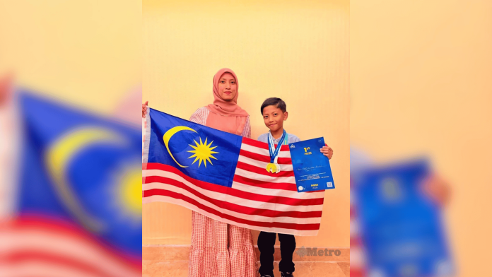 Pic1 Wan Harriz (right) accompanied by his mother, Nur Saliha managed to get first place at Hippo English Without Borders in Doha, Qatar - Photo credits Harian Metro, courtesy of Nur Saliha Ali Shastry