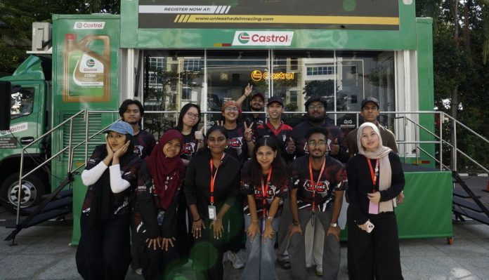 Management Science University (MSU) students pictured in front of the Unleashed Sim Racing area